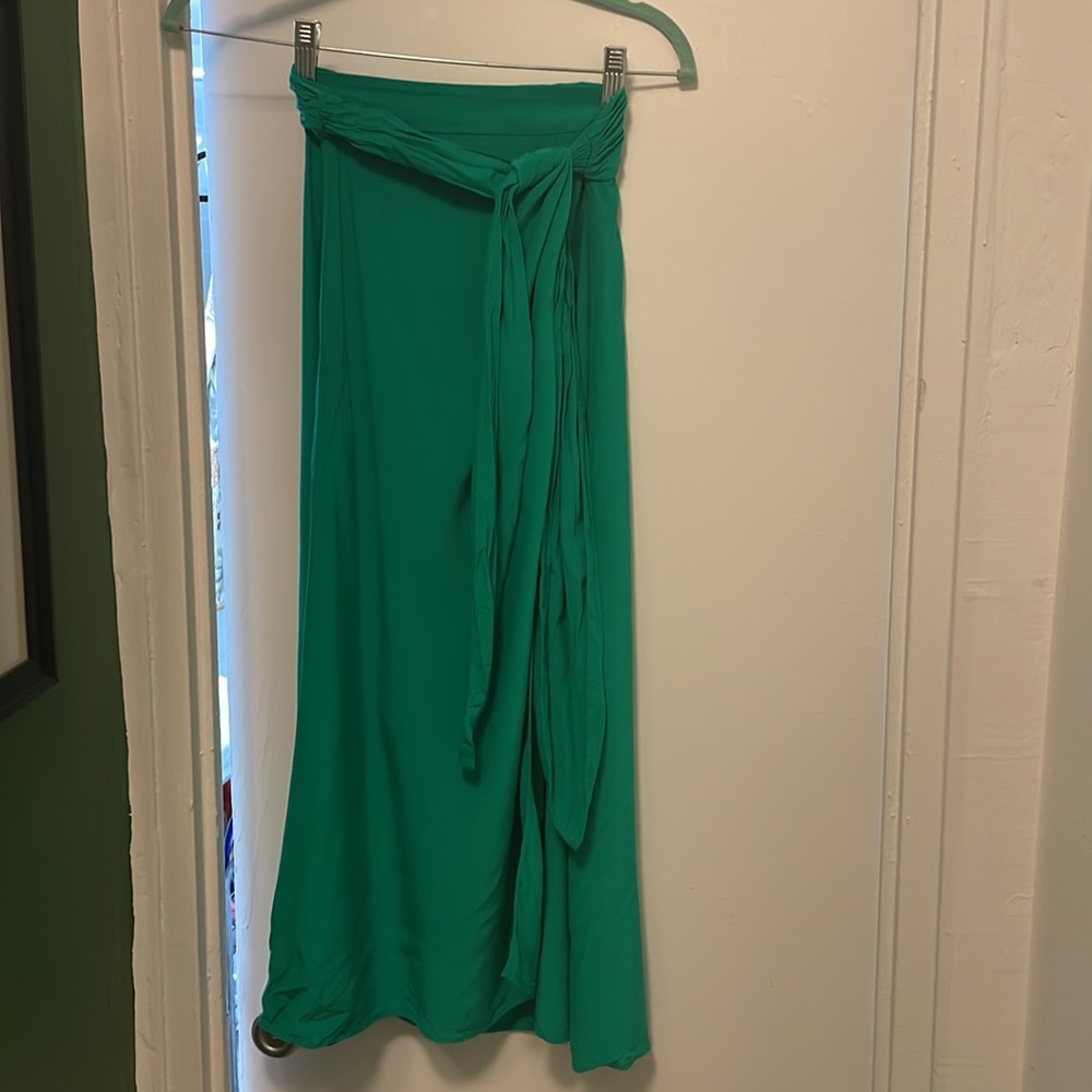 Green wrap skirt with thigh split